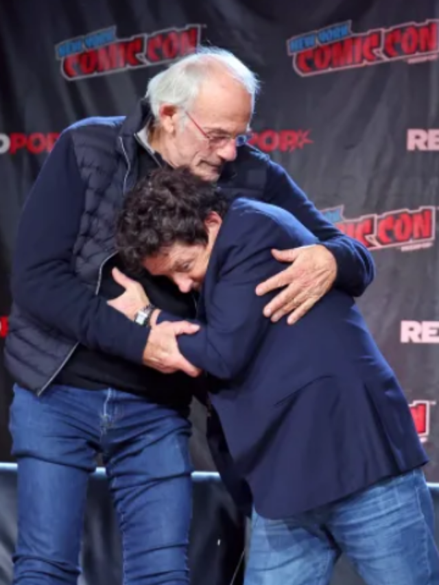 Back To The Future stars Michael J. Fox and Christopher Lloyd hug at ComicCon